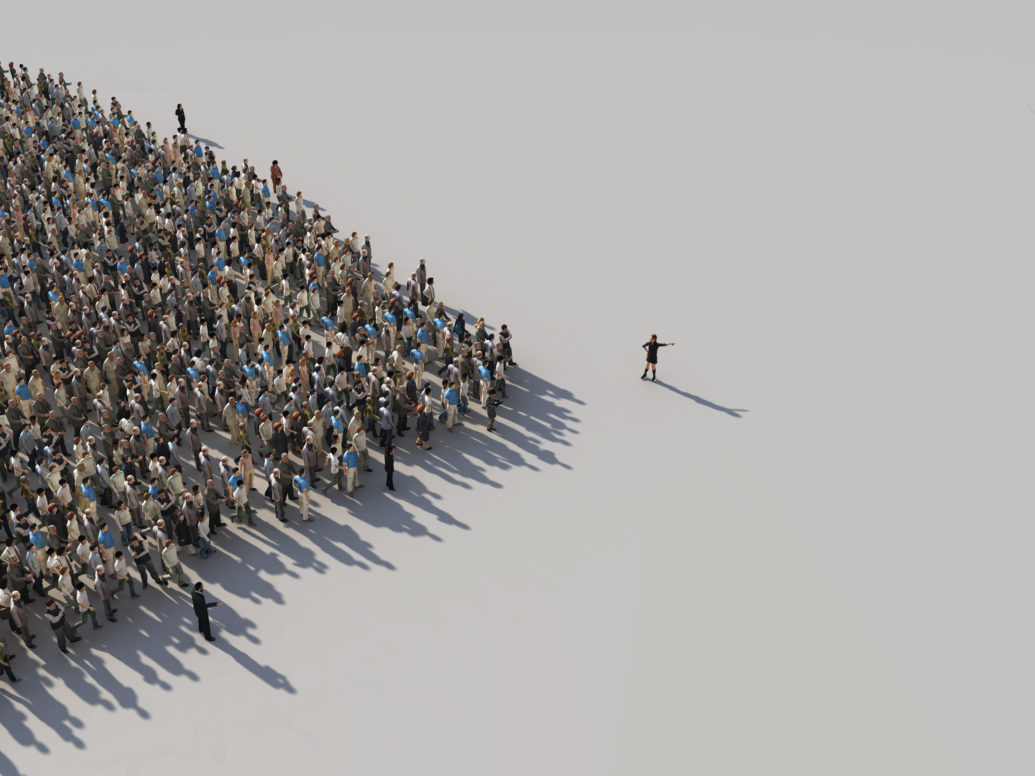 A person leading a pack of people